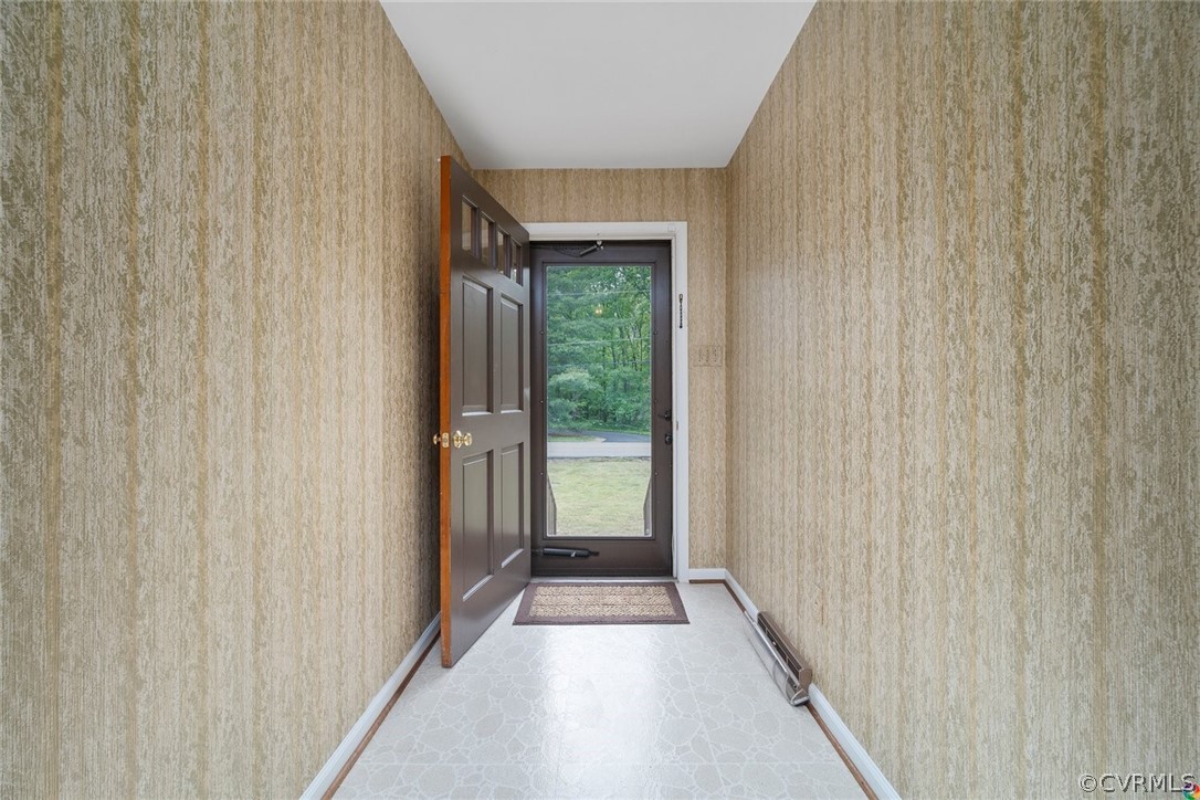 13304 South Chester Road Chester, VA 23831 - Photo 3 of 46 a view of a large window with an outdoor space