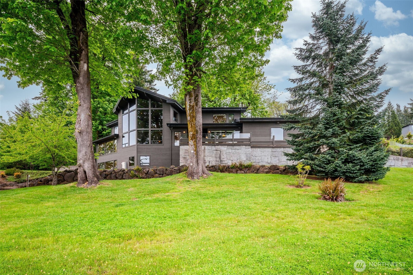 813 Varsity Road Kalama, WA 98625 - Photo 38 of 40 a view of a house with a yard and sitting area