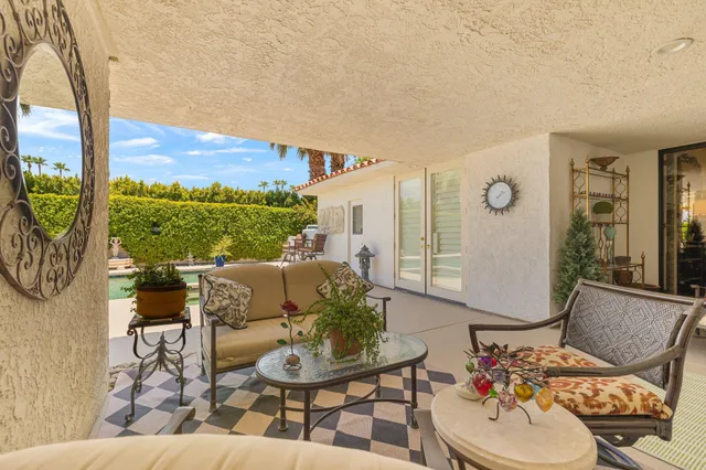 a bathroom with a bathtub sink and mirror