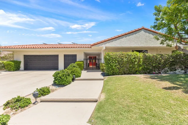an aerial view of residential house with outdoor space