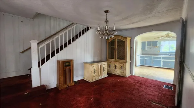 a view of an entryway with a workspace