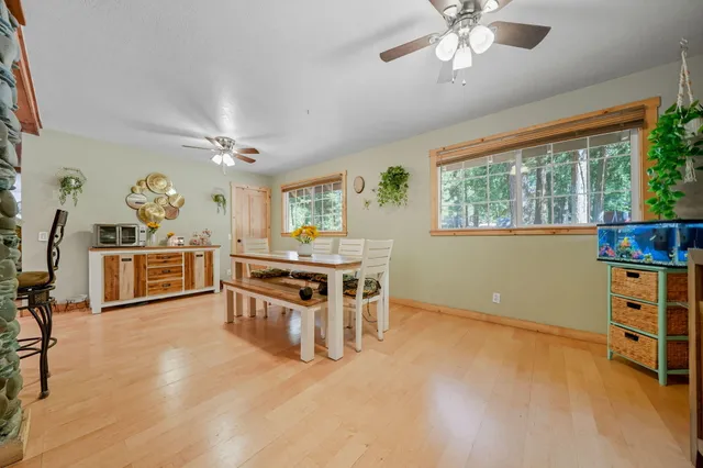 a stove top oven sitting inside of a kitchen