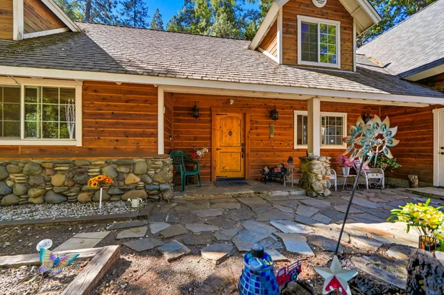 a front view of a house with patio