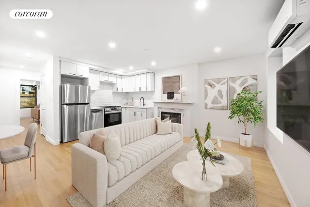 a bathroom with a toilet a sink a mirror and bathtub