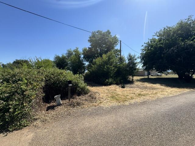 5227 Hopson Road Anderson, CA 96007 - Photo 17 of 19 a view of a road with a yard