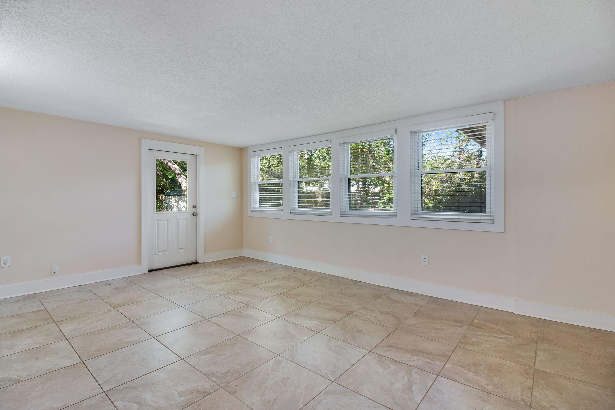 701 Planet Drive Destin, FL 32541 - Photo 15 of 25 an empty room with windows
