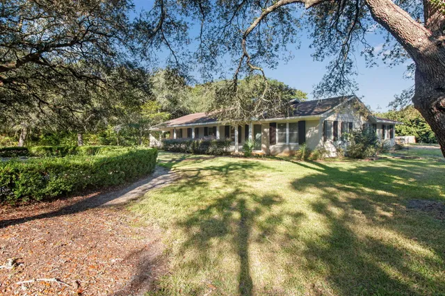 a view of swimming pool with outdoor seating
