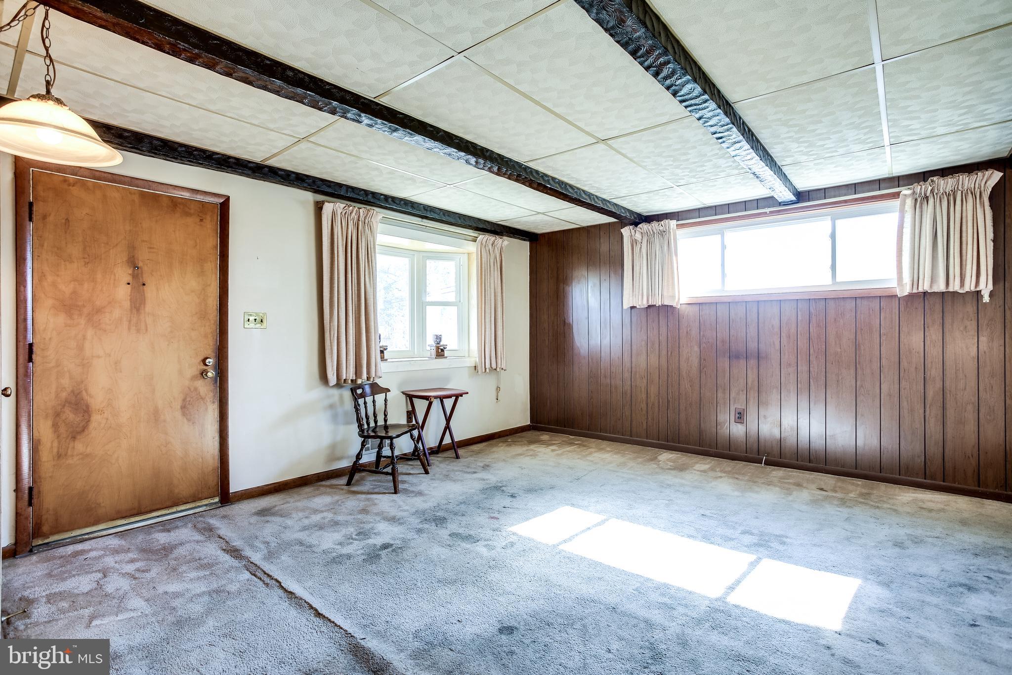 2149 Pitney Road Baltimore, MD 21234 - Photo 2 of 20 an empty room with windows
