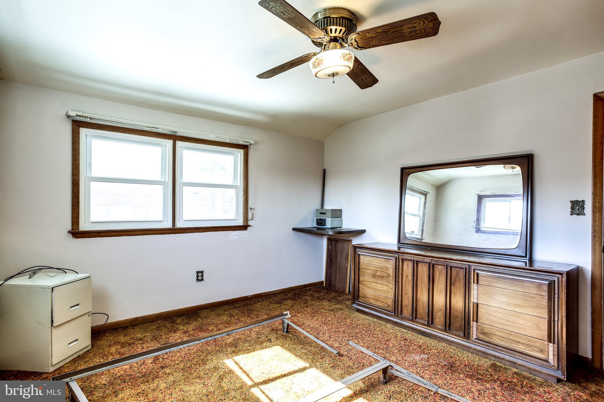 2149 Pitney Road Baltimore, MD 21234 - Photo 11 of 20 a view of an empty room with a window