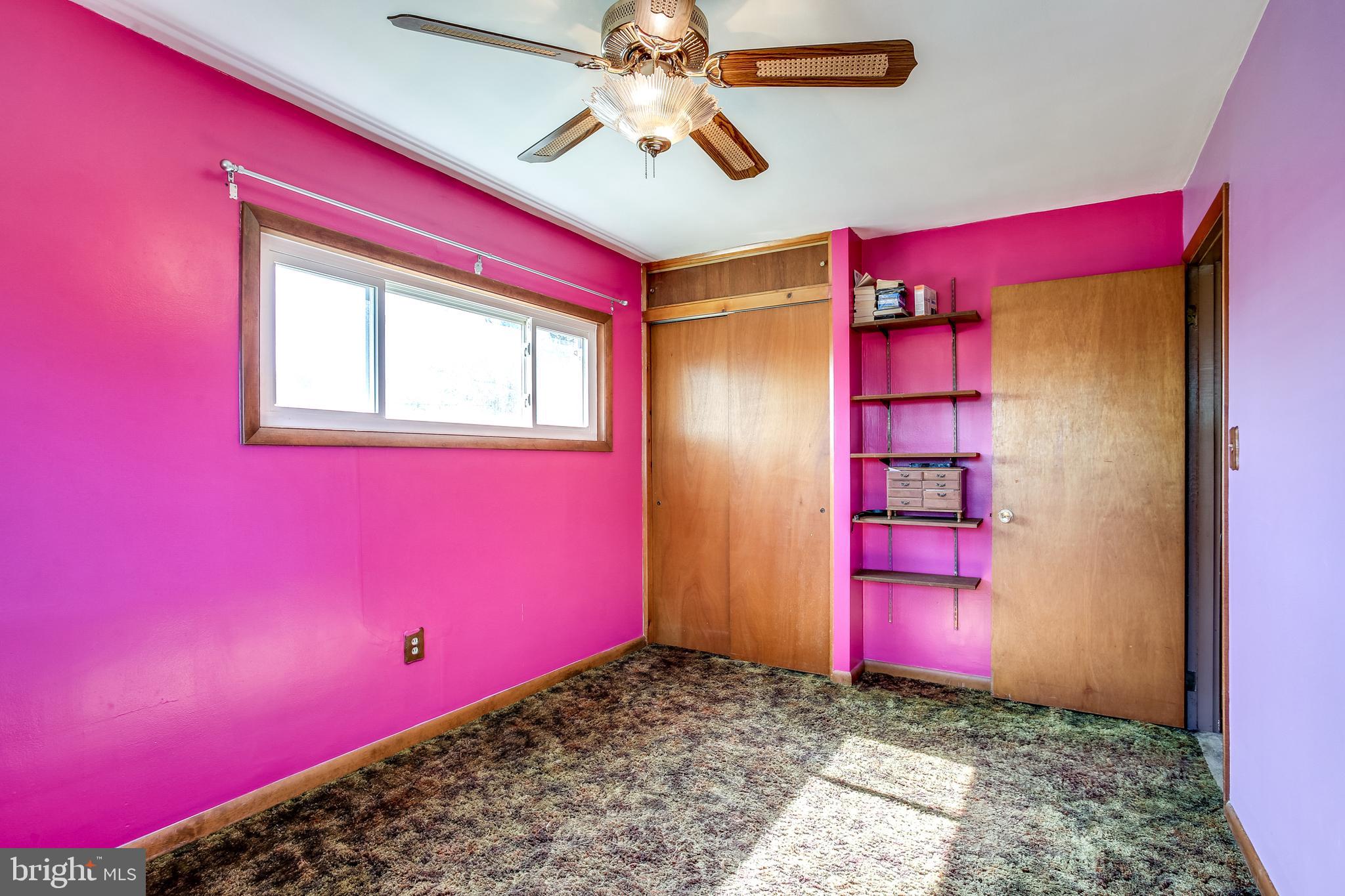 2149 Pitney Road Baltimore, MD 21234 - Photo 12 of 20 a view of a room with windows and ceiling fan