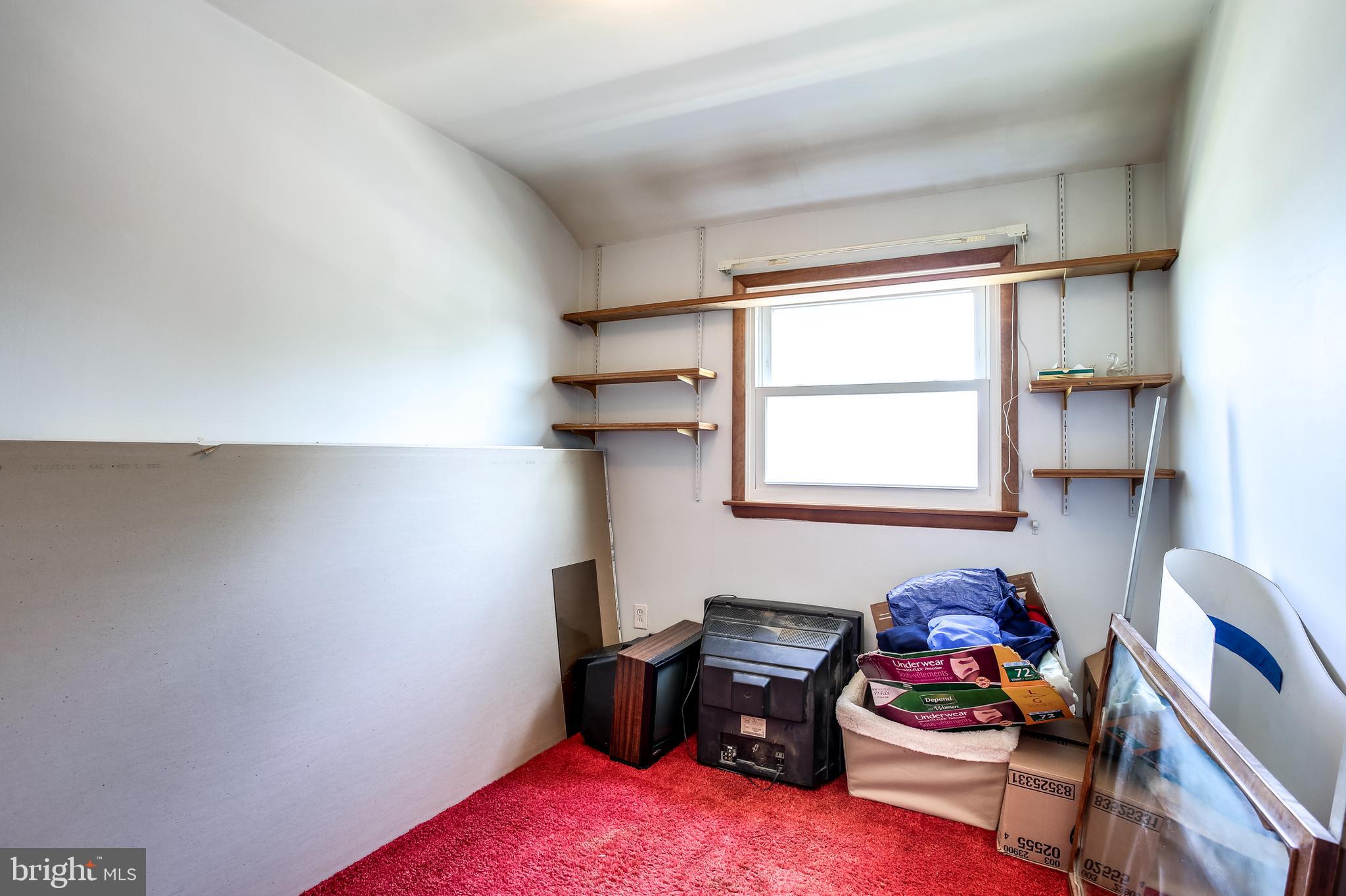 2149 Pitney Road Baltimore, MD 21234 - Photo 14 of 20 a bedroom with furniture and a window