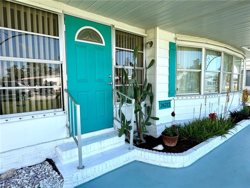 26212 Colony Road Bonita Springs, FL 34135 - Photo 2 of 34 Entry to the Florida Room.