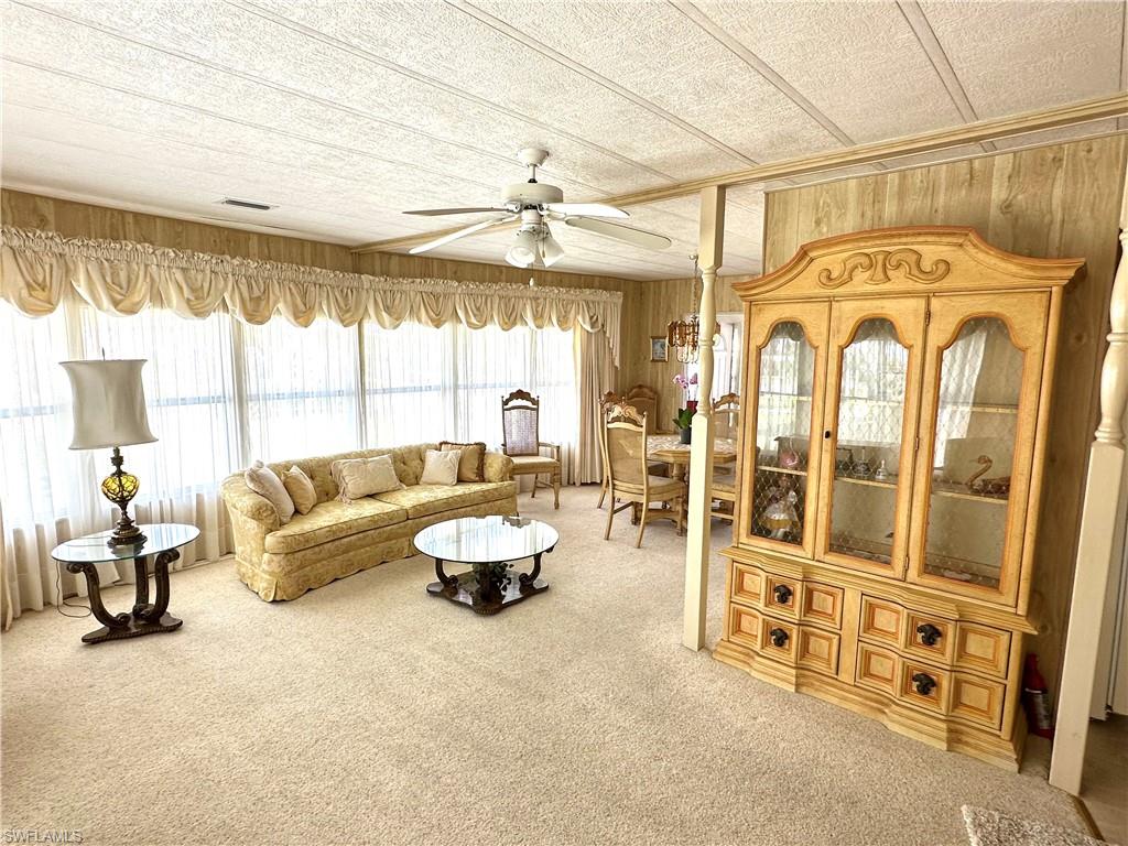 26212 Colony Road Bonita Springs, FL 34135 - Photo 27 of 34 Living room featuring hutch.