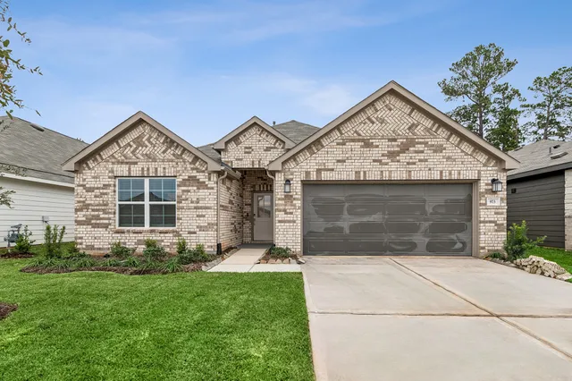 $324,990 | 973 Garden Path Drive, Willis, TX 77378