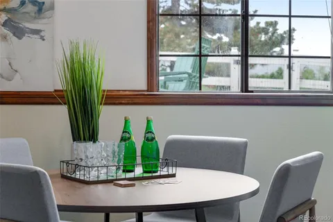 a workspace with furniture and window