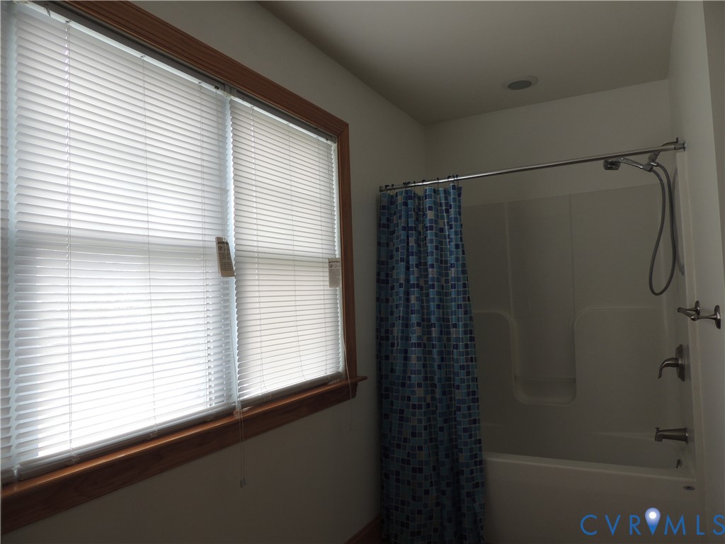 12512 Cox Road Church Road, VA 23833 - Photo 34 of 42 Full-size double window with wood-finish trim and