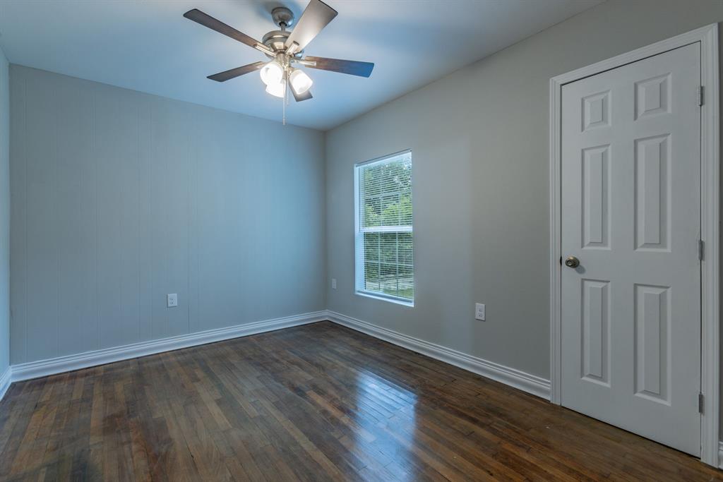 2816 Summer Avenue Waco, TX 76708 - Photo 12 of 16 wooden floor in an empty room with a window