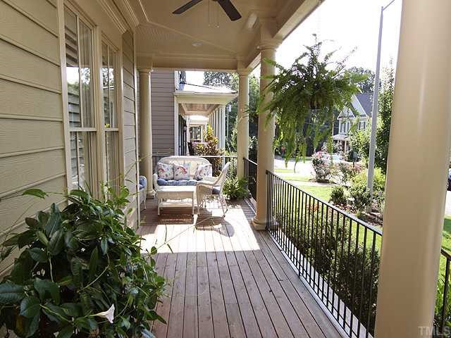 3112 Raymond Street Raleigh, NC 27607 - Photo 10 of 12 Wrap-around front porch is waiting for you and a rocking chair! Porch