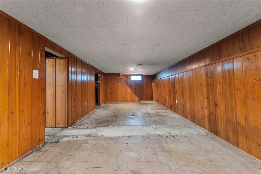 12931 Fruitside Road Garfield Heights, OH 44125 - Photo 14 of 15 Basement featuring wooden walls
