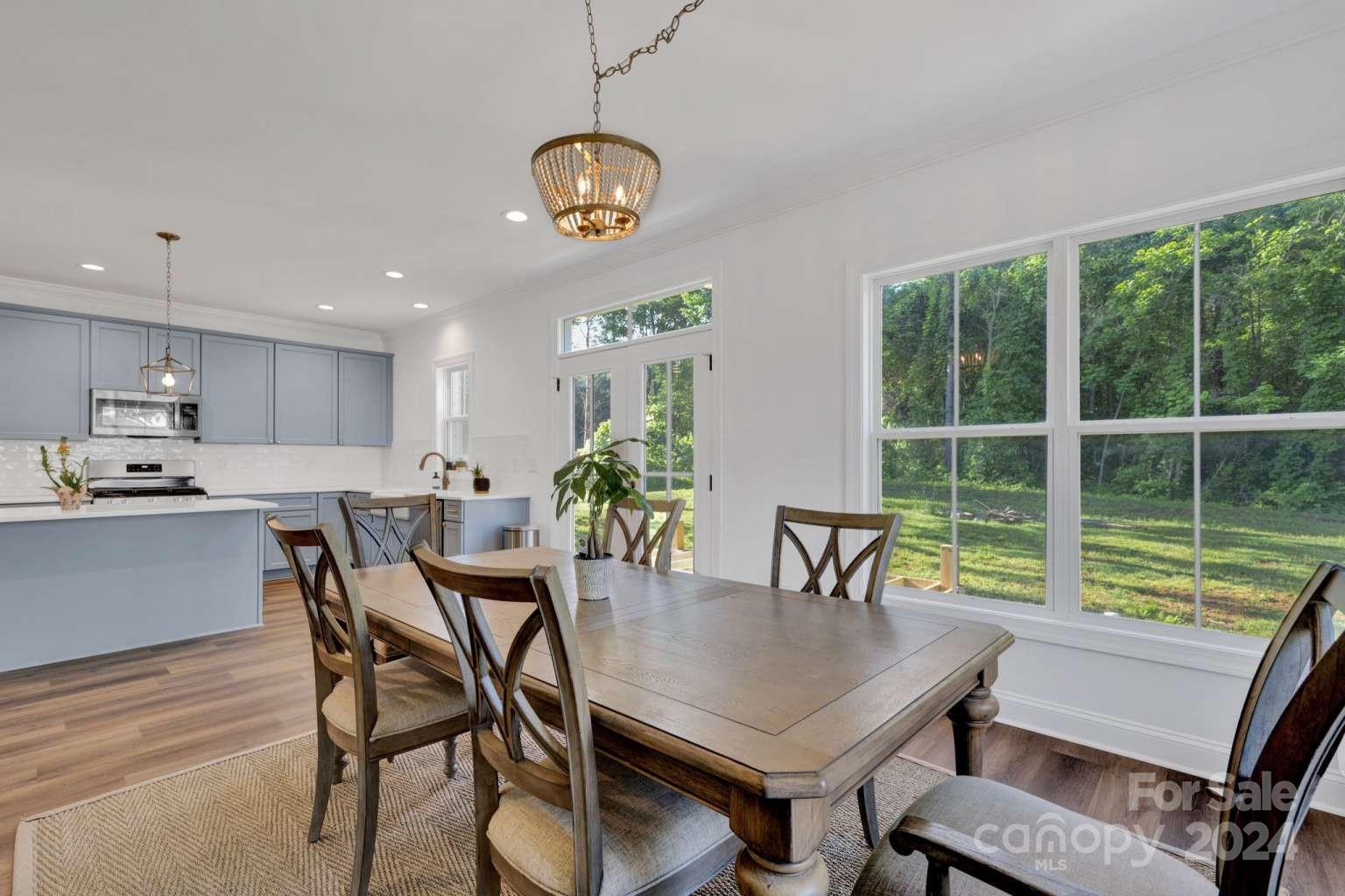 503 Arrow Point Lane Kannapolis, NC 28036 - Photo 11 of 23 a view of a dining room with furniture window and outside view