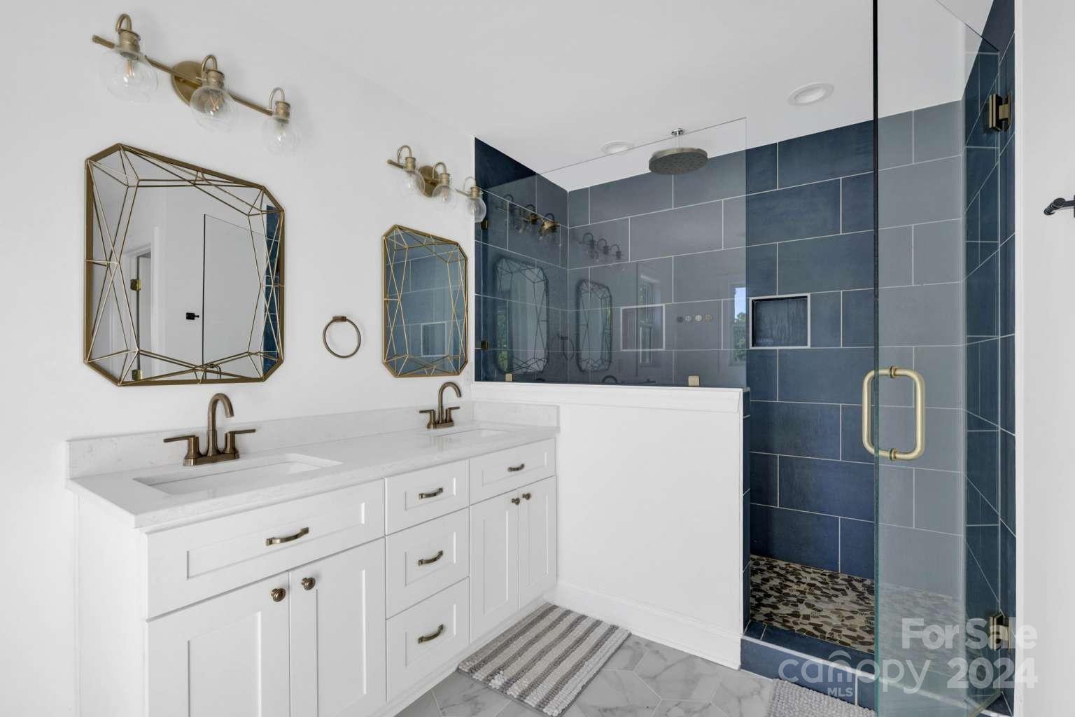 503 Arrow Point Lane Kannapolis, NC 28036 - Photo 13 of 23 a bathroom with double vanity and a mirror