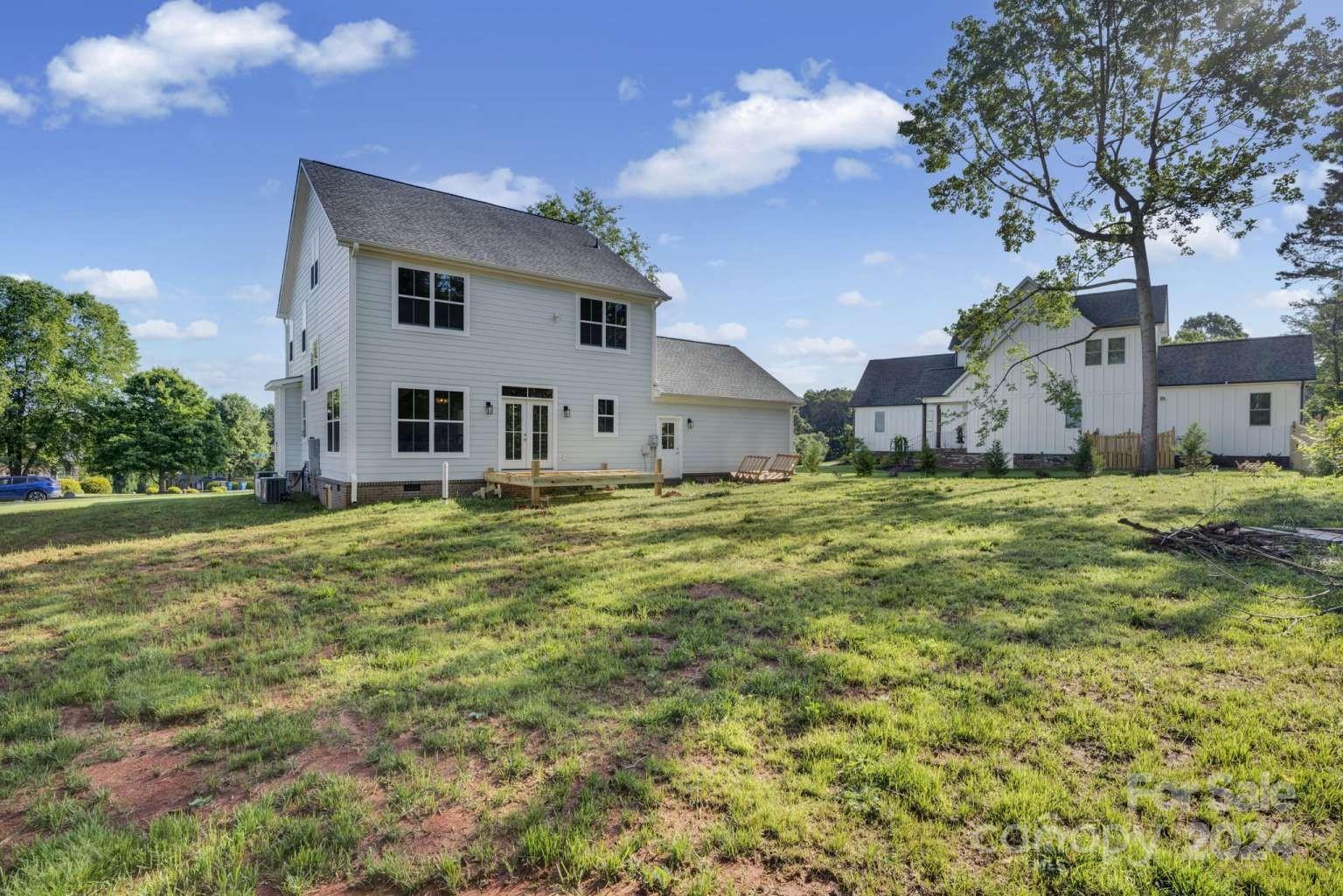 503 Arrow Point Lane Kannapolis, NC 28036 - Photo 22 of 23 a view of a house with a big yard