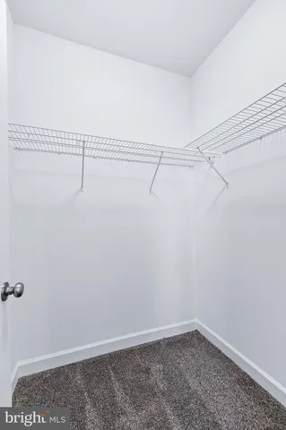 a view of small space with racks on the wall