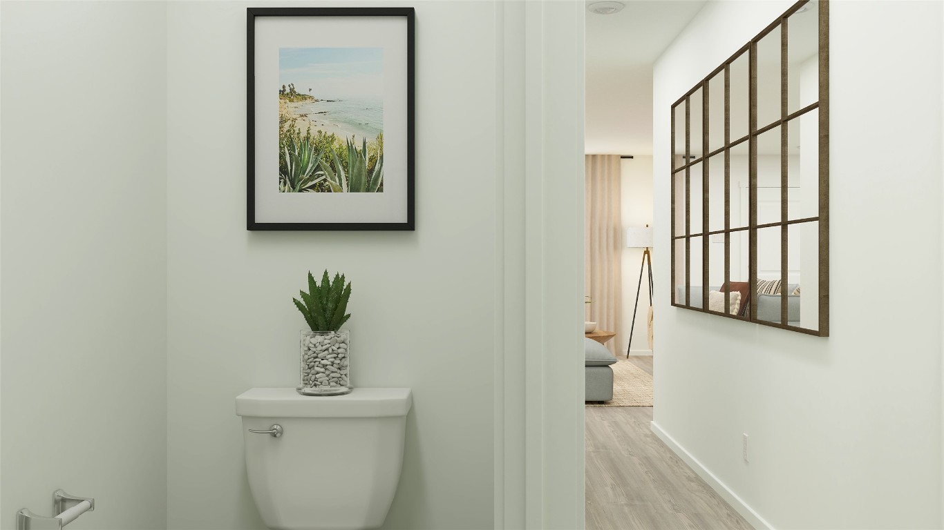 120 Dark Victory Road Jarrell, TX 76537 - Photo 18 of 27 an entryway with wooden floor and a potted plant