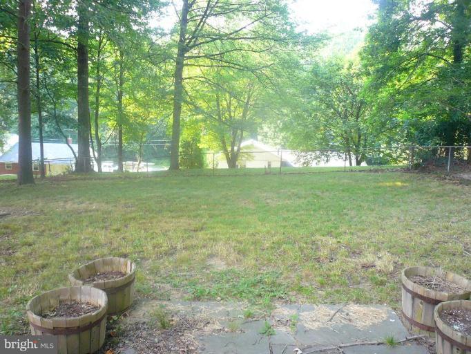 5944 Atteentee Road Springfield, VA 22150 - Photo 7 of 7 a view of an outdoor space and a yard