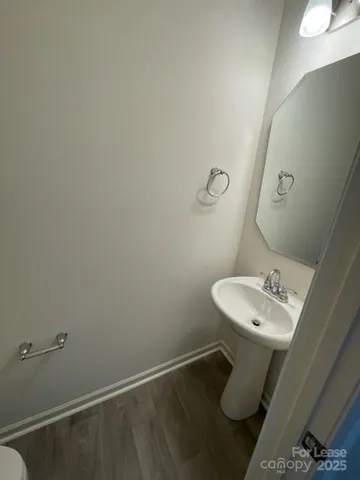 a bathroom with a sink and mirror