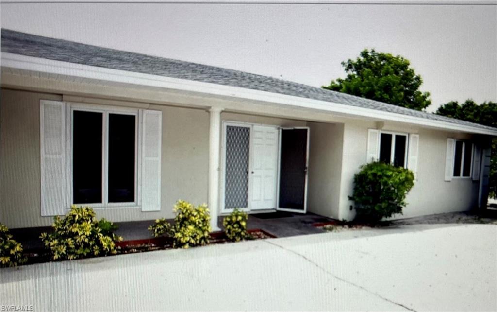 2955 Binnacle Drive Naples, FL 34103 - Photo 2 of 5 front view of a house
