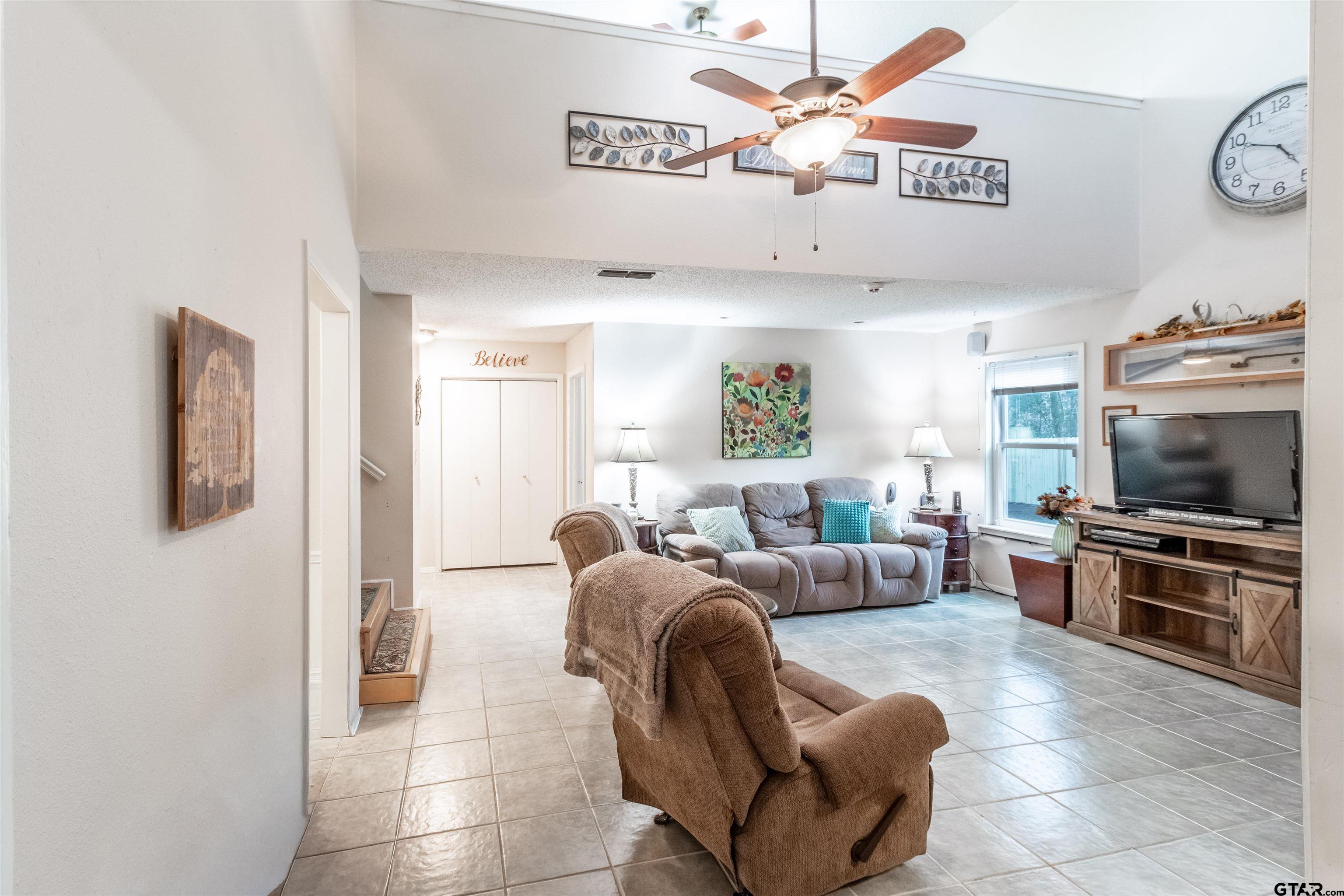 18219 Eastside Road Troup, TX 75789 - Photo 13 of 48 a living room with furniture and a flat screen tv