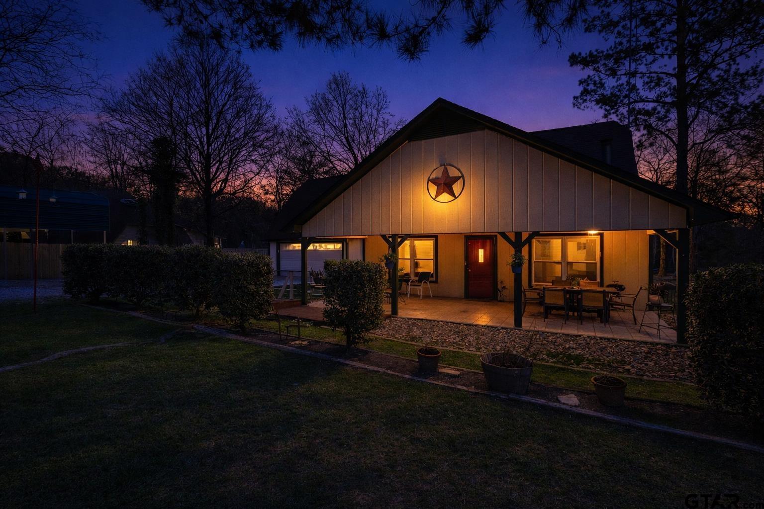 18219 Eastside Road Troup, TX 75789 - Photo 2 of 48 a view of a house with backyard and trees