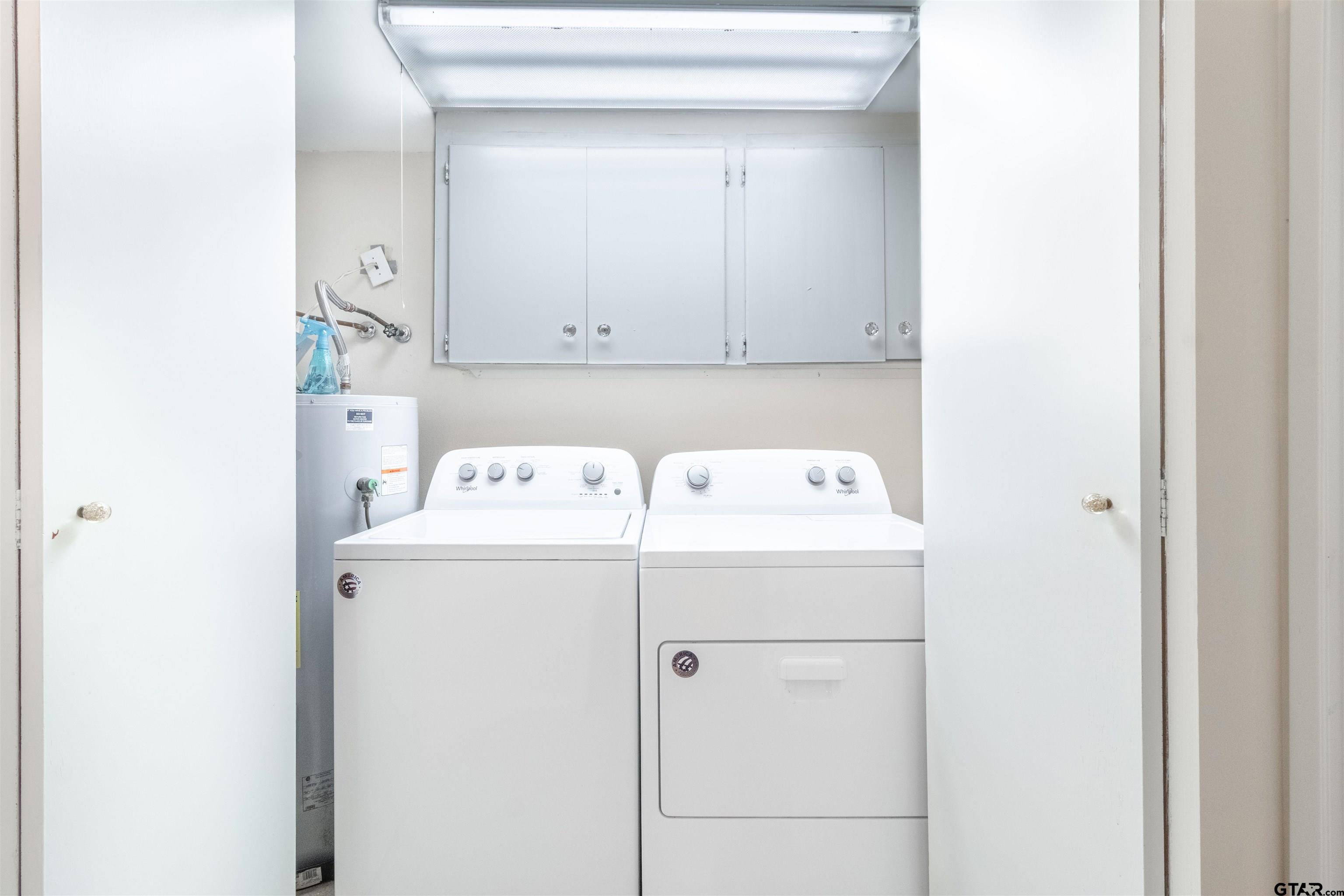 18219 Eastside Road Troup, TX 75789 - Photo 31 of 48 a utility room with dryer and washer
