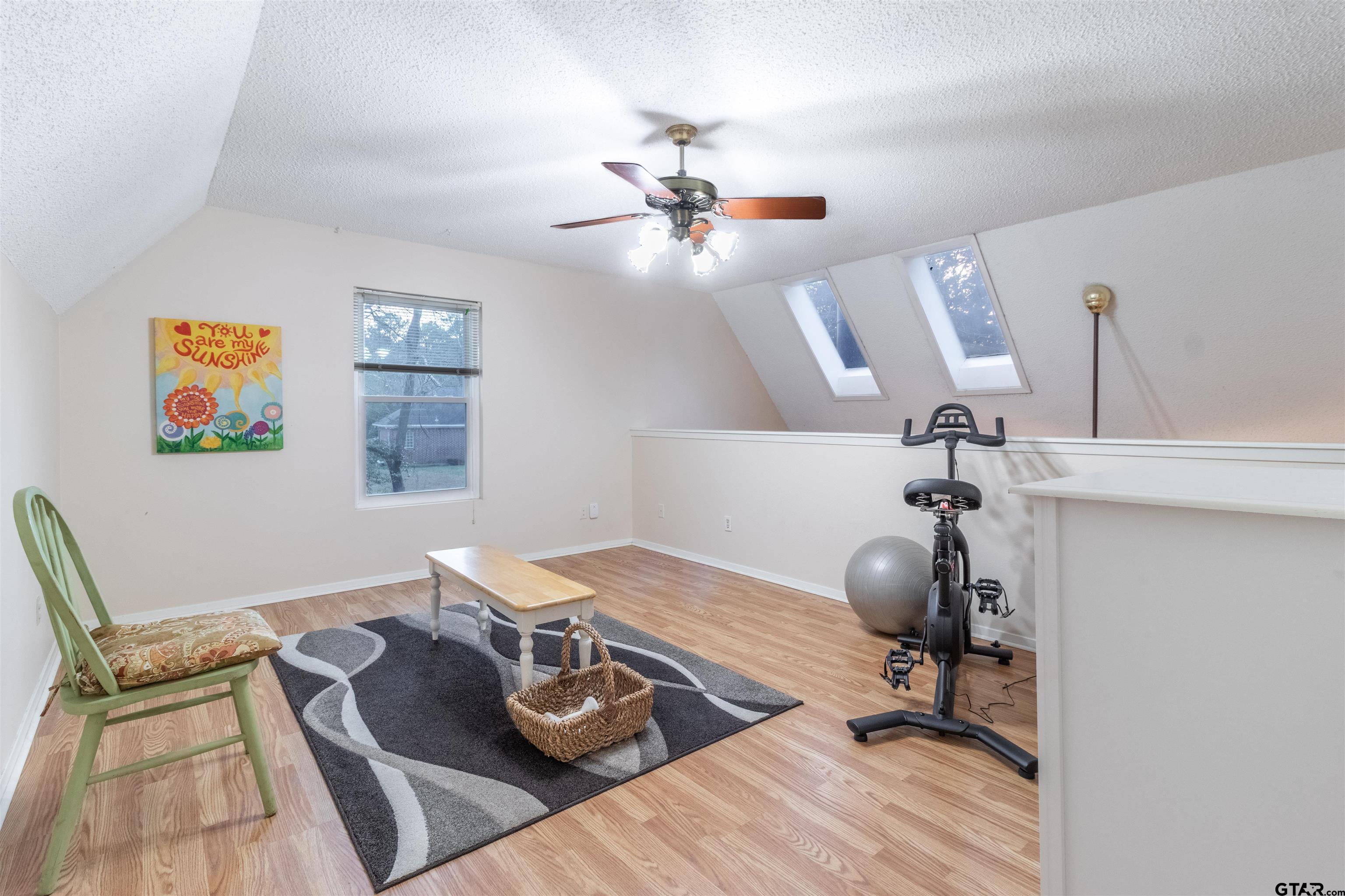 18219 Eastside Road Troup, TX 75789 - Photo 37 of 48 a view of a workspace with furniture and a window