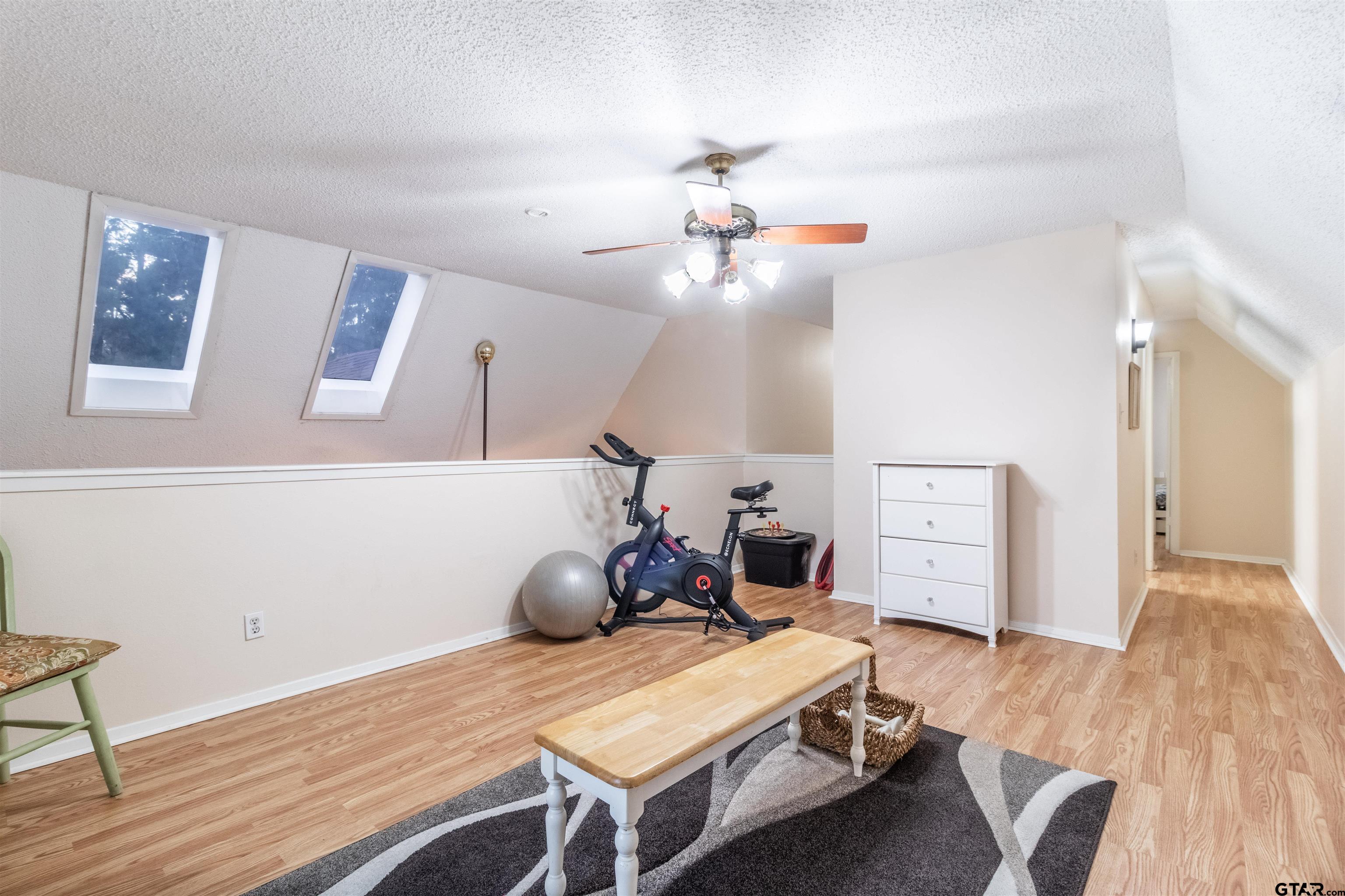 18219 Eastside Road Troup, TX 75789 - Photo 38 of 48 a living room with furniture and wooden floor