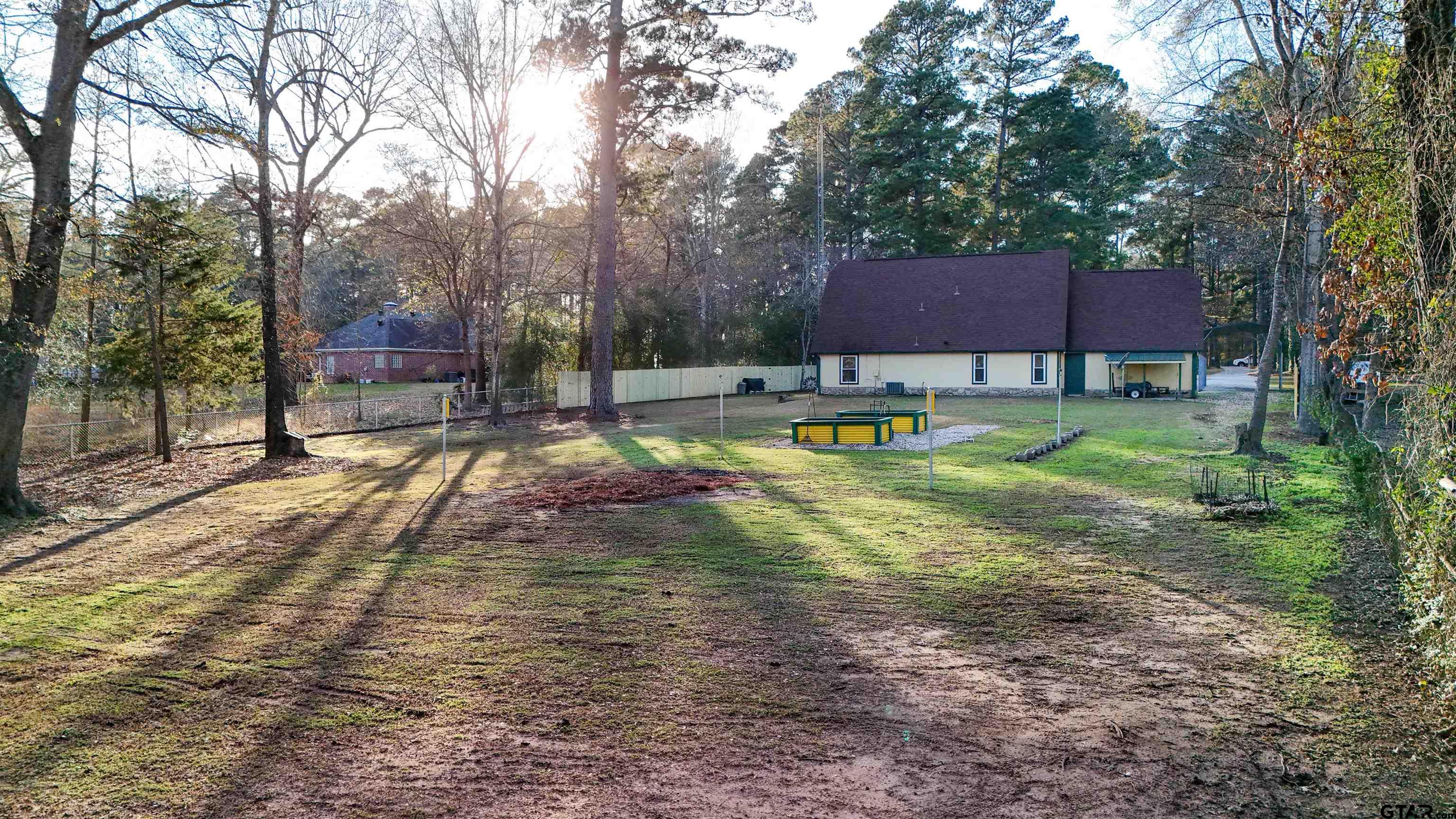 18219 Eastside Road Troup, TX 75789 - Photo 43 of 48 a view of a house with a yard