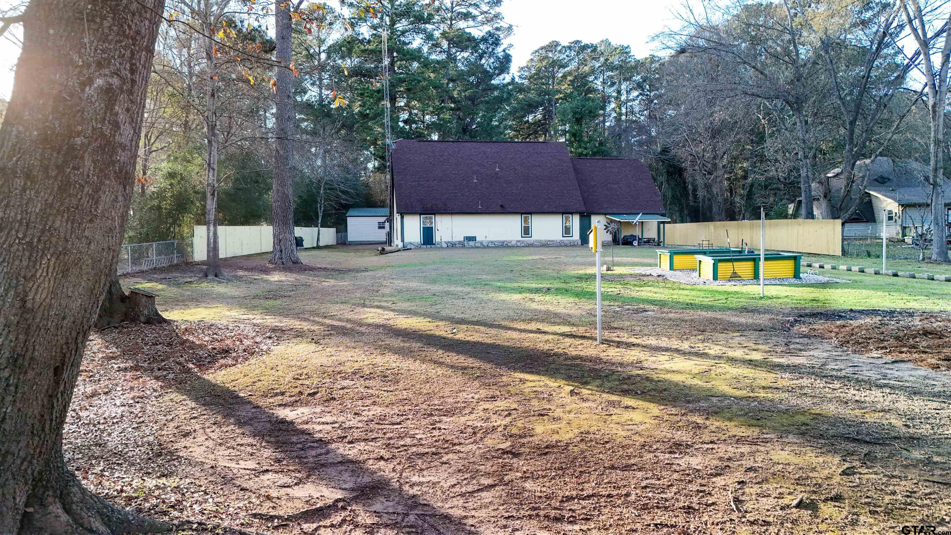 18219 Eastside Road Troup, TX 75789 - Photo 44 of 48 a house view with a sitting space and garden view