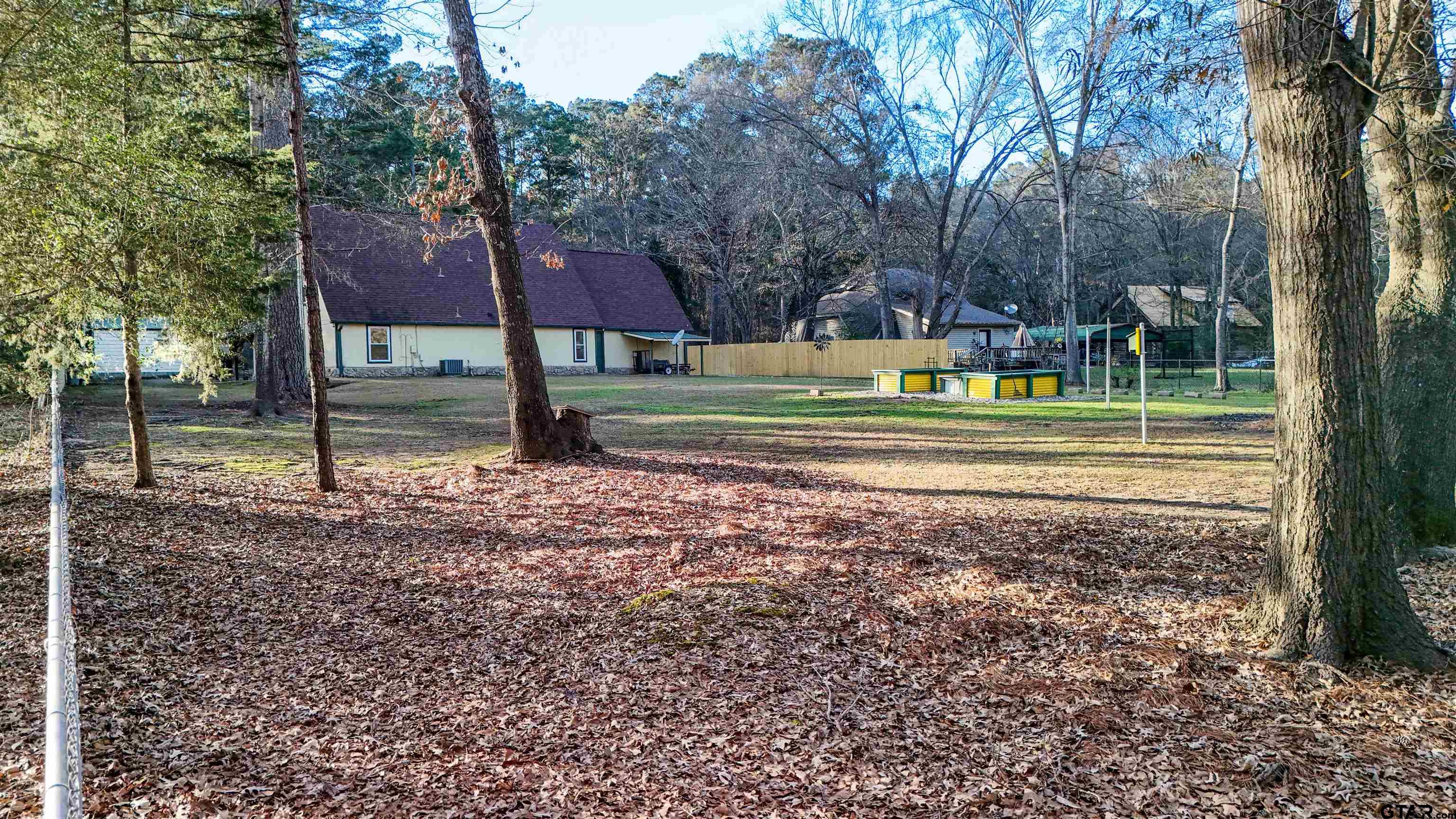 18219 Eastside Road Troup, TX 75789 - Photo 45 of 48 a view of a house with a yard