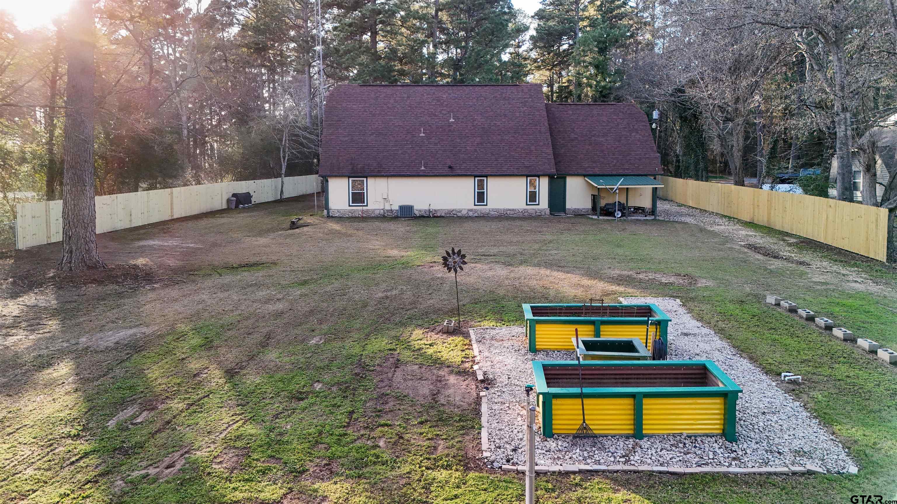 18219 Eastside Road Troup, TX 75789 - Photo 46 of 48 a aerial view of a house with swimming pool