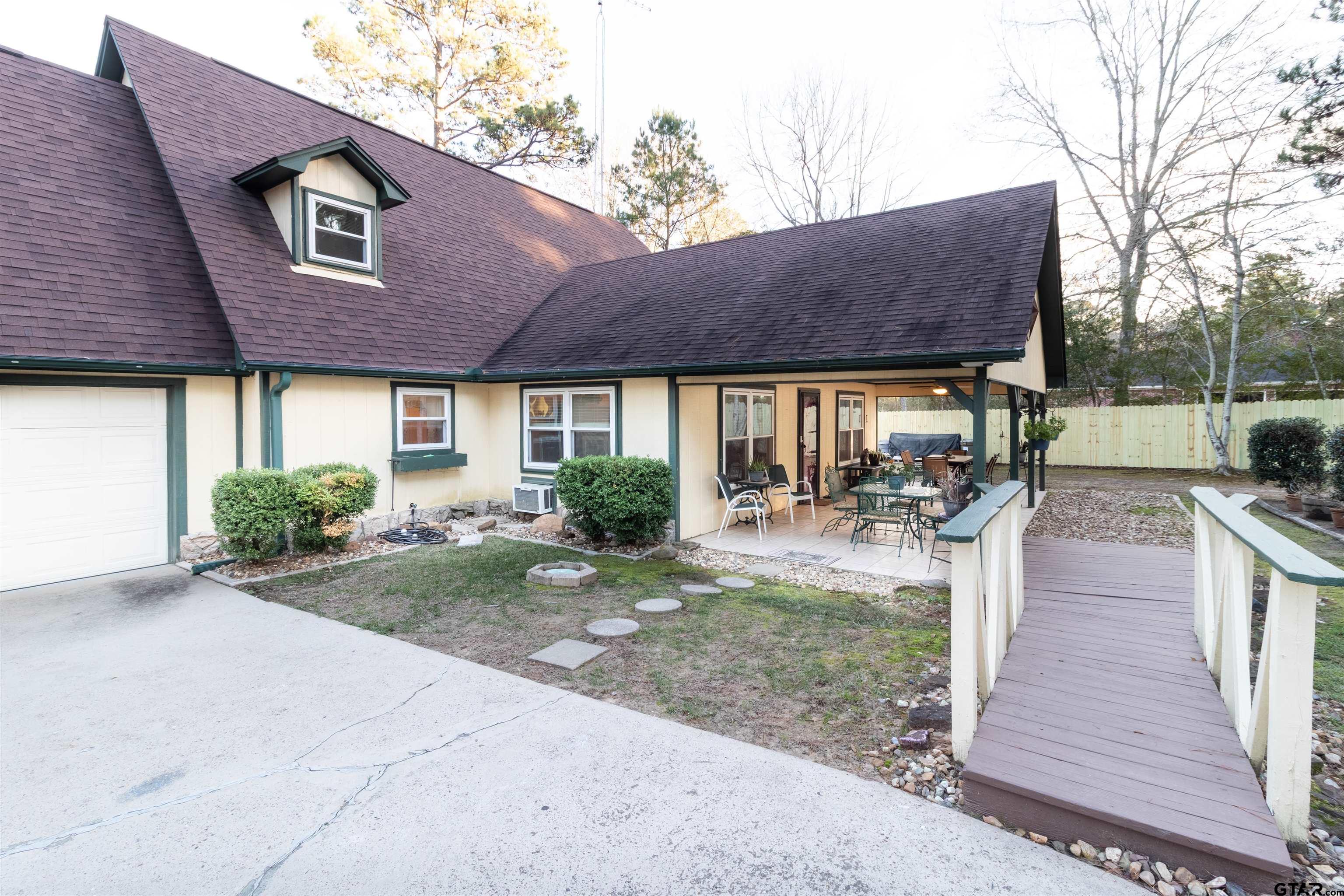 18219 Eastside Road Troup, TX 75789 - Photo 7 of 48 a house view with a outdoor space and sitting space