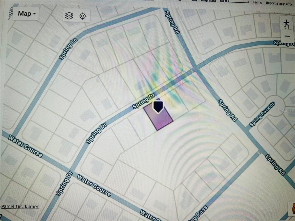 439 Spring Drive Ocala, FL 34472 - Photo 2 of 3 a bed with white sheets and pillows on it