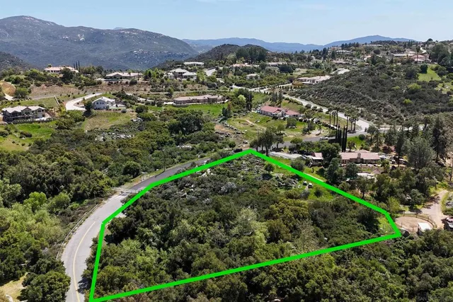 an aerial view of residential house and outdoor space