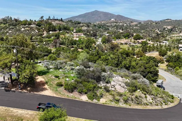 an aerial view of residential house and outdoor space