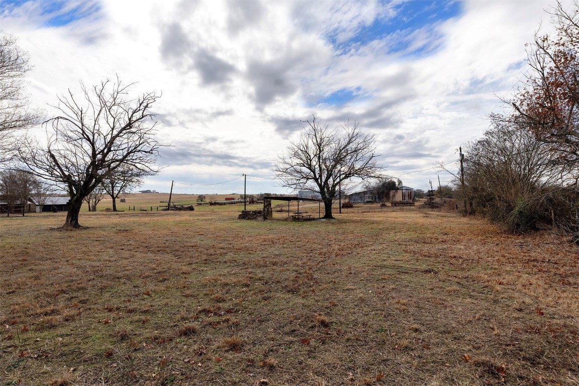 1111 East Main Street Troy, TX 76579 - Photo 4 of 17 a view of outdoor space with trees