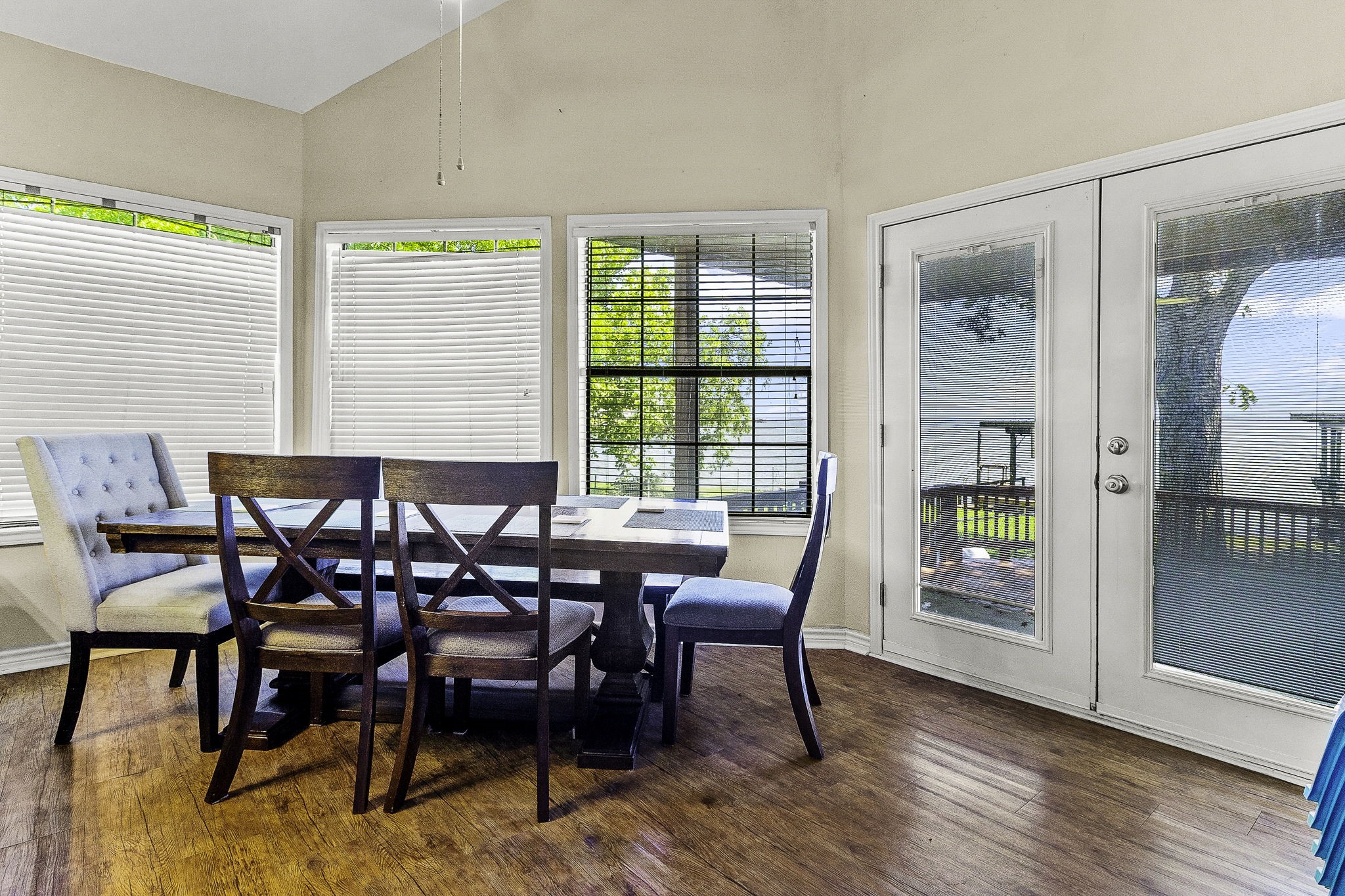 536 Weavers Cove Road Livingston, TX 77351 - Photo 13 of 44 a dining room with furniture and wooden floor