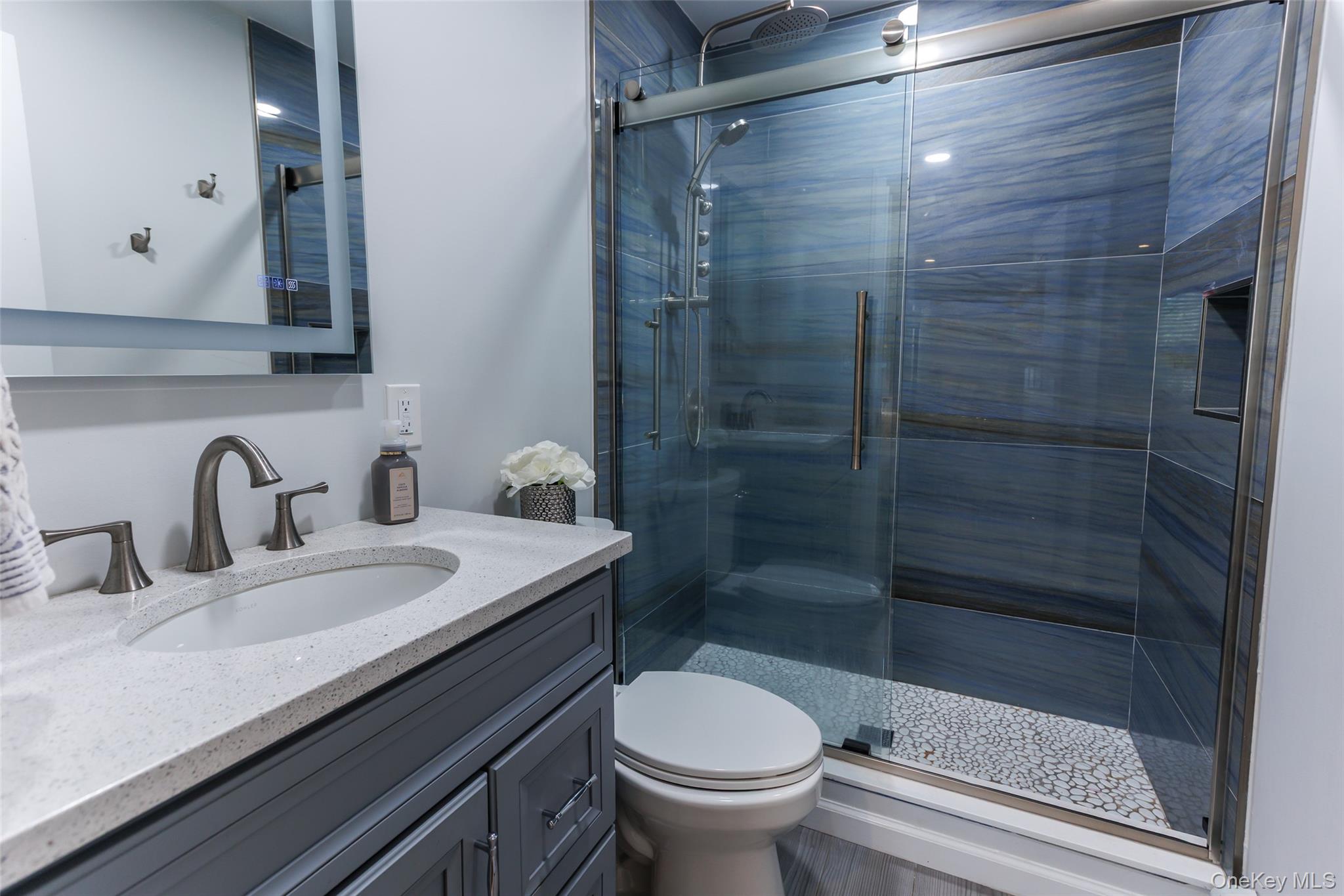 401 Little East Neck Road South Babylon, NY 11702 - Photo 11 of 32 Coastal Themed Full Bath on First Floor attached to a Bedroom on the First Floor