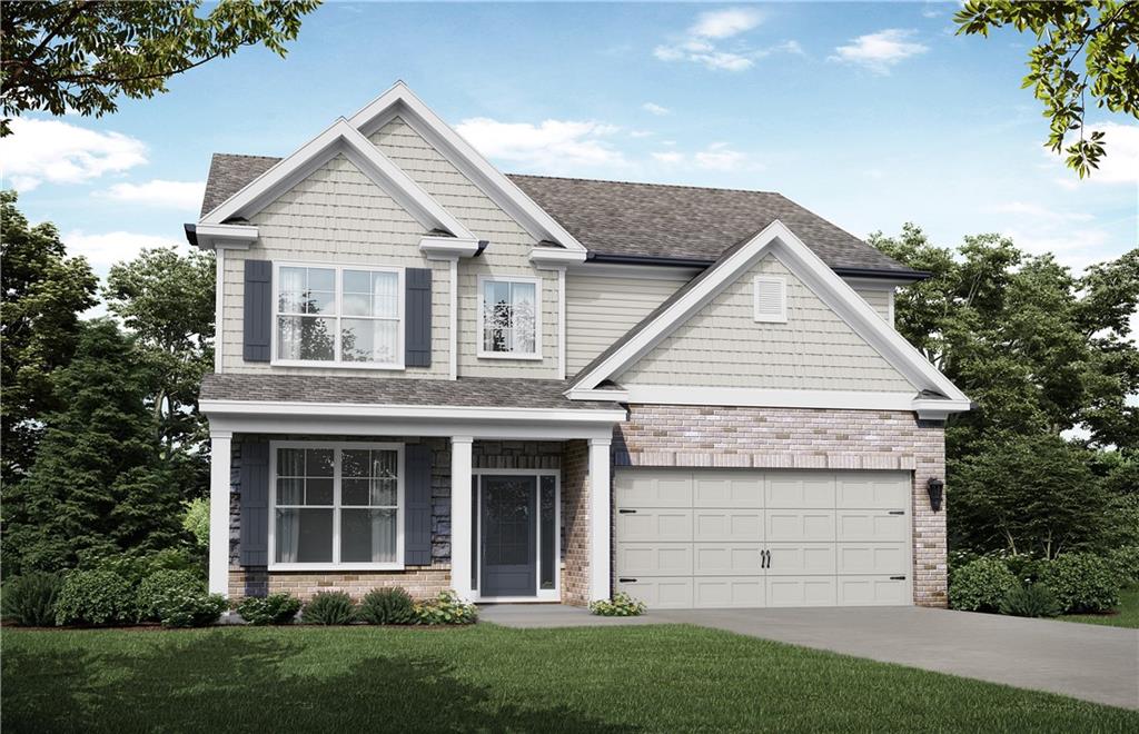 front view of a house with a yard