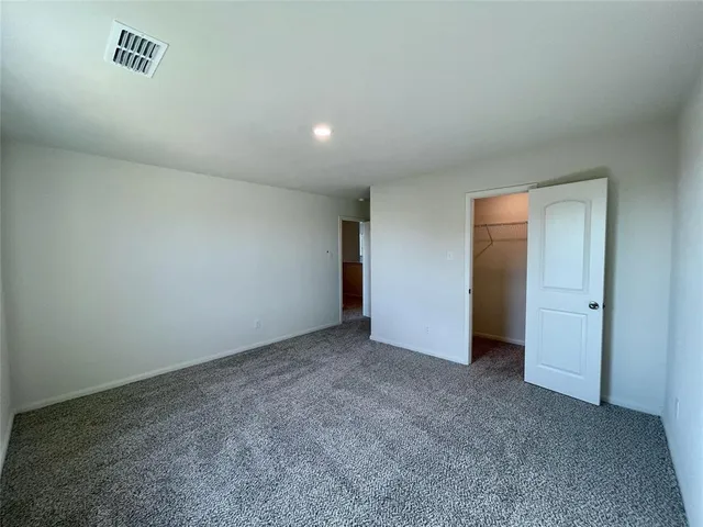 an empty room with an entryway