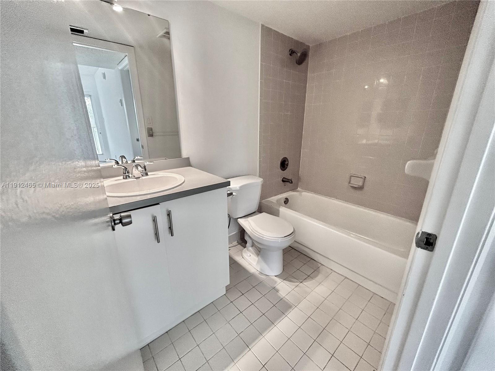 540 South Park Road, Unit 229 Hollywood, FL 33021 - Photo 12 of 44 a bathroom with a sink a toilet and shower